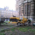 Static line running from a trailer-mounted concrete pump in London