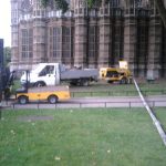 Static line running to trailer-mounted concrete pump in London