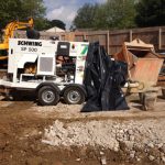 Schwing SP 500 concrete trailer pump on-site