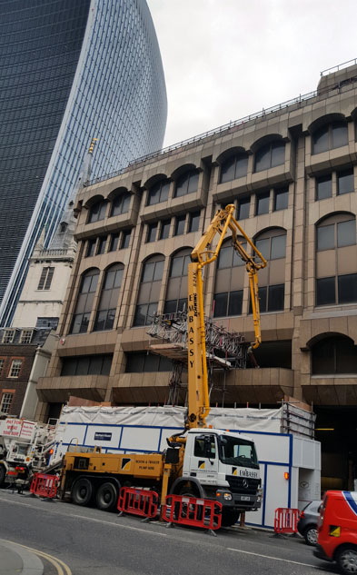 24m Concrete pump going into the 1st floor and piping up to the 7th.