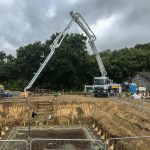 Schwing 28m pouring a reinforced Concrete basement slab in Mayfield East, Sussex