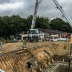 Schwing 28m pouring a reinforced Concrete basement slab in Mayfield East, Sussex
